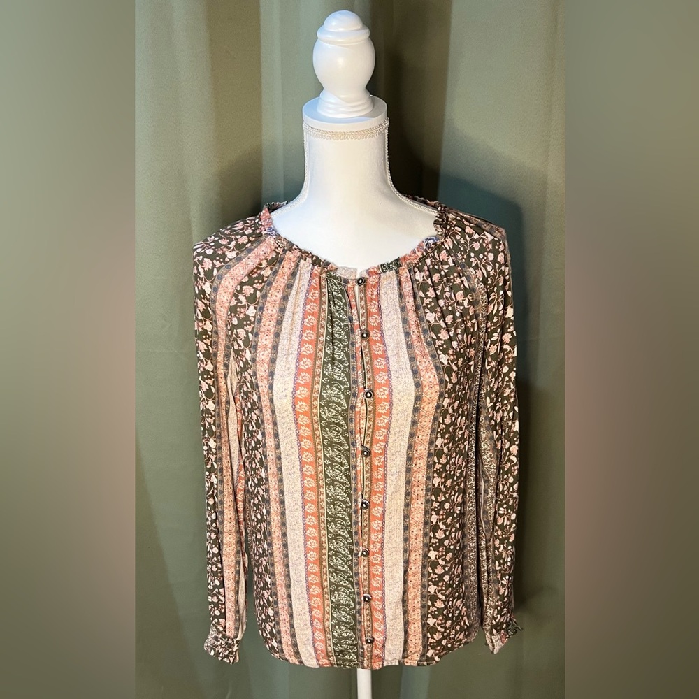 Beautiful earth tone blouse by Maurice’s.